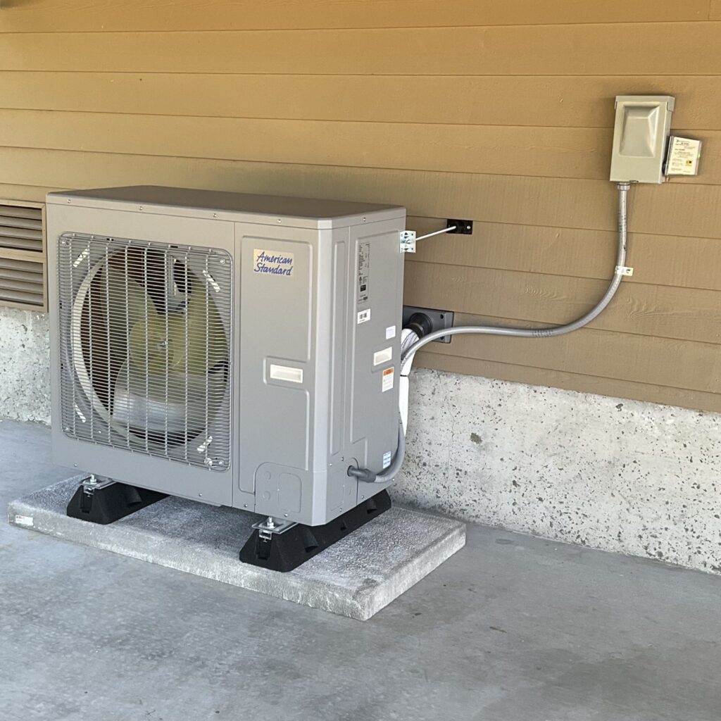 High-efficiency heat pump outdoor unit installed by Sound Comfort Heating in Snohomish County
