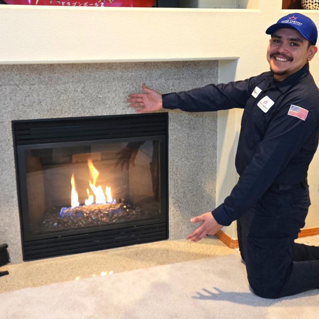Licensed HVAC technician standing in front of repaired HVAC unit in Everett, WA