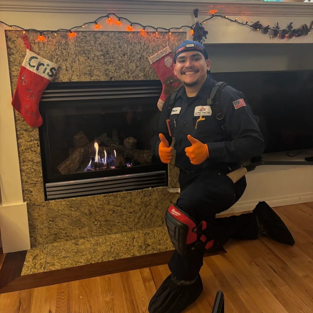 Sound Comfort Heating technician giving a thumbs-up after a gas fireplace repair in Lake Stevens